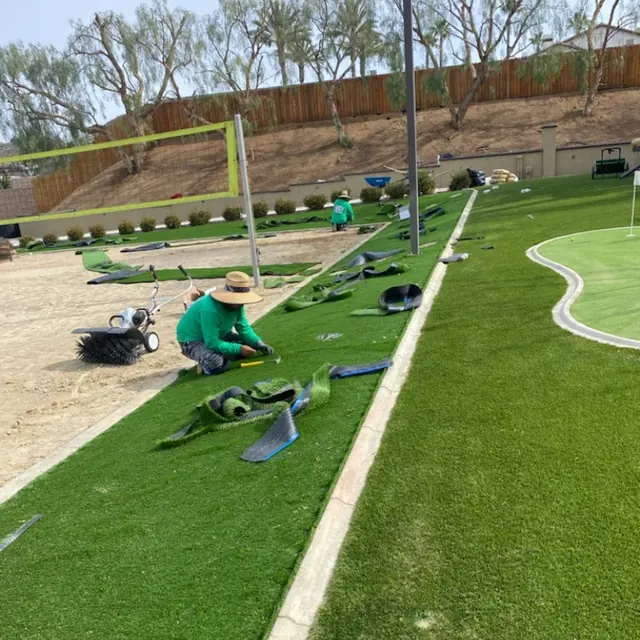Millenium crew working on a turf and hardscape job in Perris, CA
